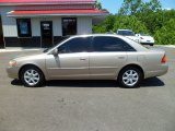 2002 Desert Sand Metallic Toyota Avalon XLS #66338379