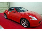 Solid Red Nissan 370Z in 2010