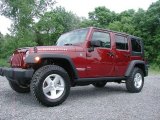 2009 Jeep Wrangler Unlimited Red Rock Crystal Pearl