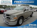 2010 Austin Tan Pearl Dodge Ram 1500 SLT Quad Cab #67104452