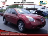 2009 Venom Red Nissan Rogue S #68093813