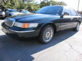 Aspen Green Metallic Mercury Grand Marquis in 2002