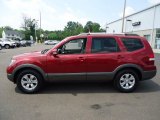 Spicy Red Kia Borrego in 2009