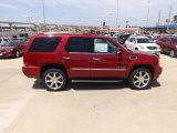 Crystal Red Tintcoat Cadillac Escalade in 2013