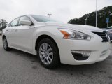 Pearl White Nissan Altima in 2013