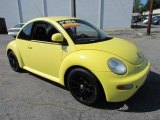 Yellow Volkswagen New Beetle in 2000
