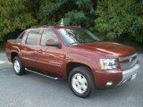 Deep Ruby Red Metallic Chevrolet Avalanche in 2009