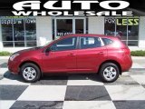 2009 Venom Red Nissan Rogue S #70818685