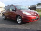 2010 Salsa Red Pearl Toyota Sienna LE #71062460
