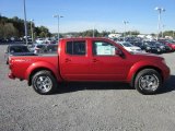 Lava Red Nissan Frontier in 2012