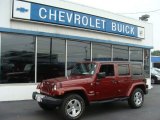 2009 Red Rock Crystal Pearl Jeep Wrangler Unlimited Sahara 4x4 #71744637