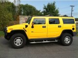 2003 Yellow Hummer H2 SUV #71745053