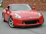 2009 Solid Red Nissan 370Z Sport Touring Coupe #72992045