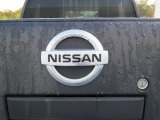2011 Nissan Frontier SV Crew Cab 4x4 Marks and Logos