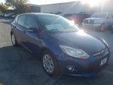 2013 Performance Blue Ford Focus SE Hatchback #74039452