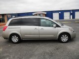 Coral Sand Metallic Nissan Quest in 2004