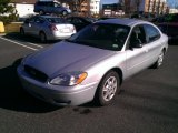 2004 Silver Frost Metallic Ford Taurus LX Sedan #74489796