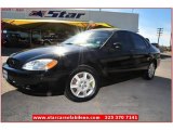 2004 Black Ford Taurus SE Sedan #74624754