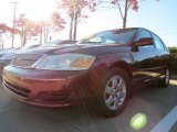 Vintage Red Pearl Toyota Avalon in 2001