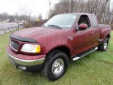 2003 Ford F150 XLT SuperCab 4x4 Front 3/4 View