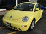 Yellow Volkswagen New Beetle in 2000