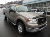 2004 Ford F150 XLT SuperCab 4x4 Front 3/4 View