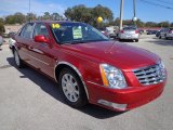 Crystal Red Tintcoat Cadillac DTS in 2010