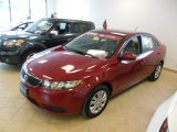 Spicy Red Kia Forte in 2012