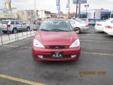 Sangria Red Metallic Ford Focus in 2002