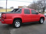 Victory Red Chevrolet Avalanche in 2011