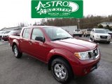 Lava Red Nissan Frontier in 2012