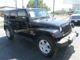 2009 Black Jeep Wrangler Unlimited Sahara 4x4 #79427106
