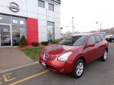 2010 Venom Red Nissan Rogue SL AWD #79569593