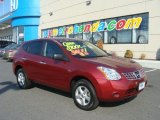 2010 Venom Red Nissan Rogue S AWD 360 Value Package #79713928