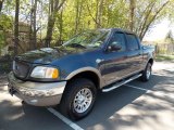 Charcoal Blue Metallic Ford F150 in 2003