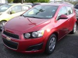 Crystal Red Tintcoat Chevrolet Sonic in 2013
