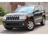 2010 Jeep Grand Cherokee Laredo 4x4 Front 3/4 View