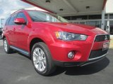 Rally Red Metallic Mitsubishi Outlander in 2013