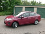 2011 Bright Magenta Metallic Ford Fiesta SE Sedan #83377405