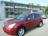 2009 Venom Red Nissan Rogue SL AWD #83499273