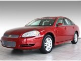 Crystal Red Tintcoat Chevrolet Impala in 2013