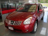 2009 Venom Red Nissan Rogue SL AWD #83774858