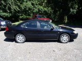 2004 Black Ford Taurus SEL Sedan #83836094