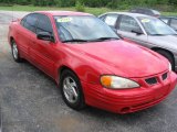 Bright Red Pontiac Grand Am in 1999