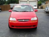 Victory Red Chevrolet Aveo in 2004