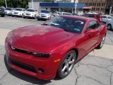 Red Rock Metallic Chevrolet Camaro in 2014