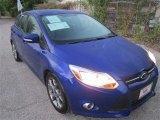 2013 Performance Blue Ford Focus SE Hatchback #85066416