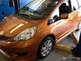 2010 Orange Revolution Metallic Honda Fit Sport #85184289