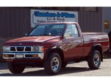 1995 Cherry Red Pearl Metallic Nissan Hardbody Truck XE Regular Cab 4x4 #86158463