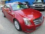 Crystal Red Tintcoat Cadillac CTS in 2010